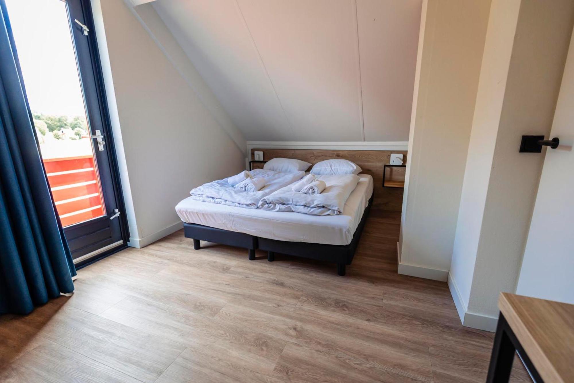 Vakantiepark 't Broeckhuys Hotel Ewijk Kamer foto